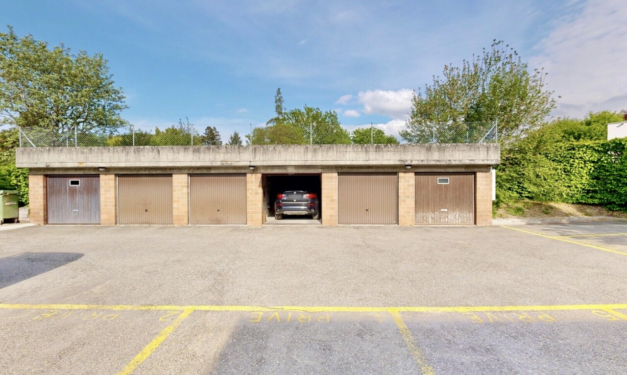 view of property with an outbuilding