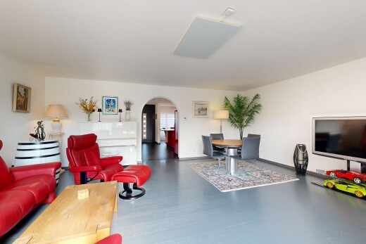 living area with arched walkways