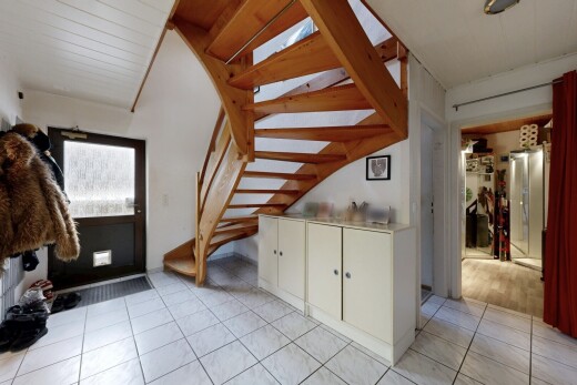staircase with tile patterned floors