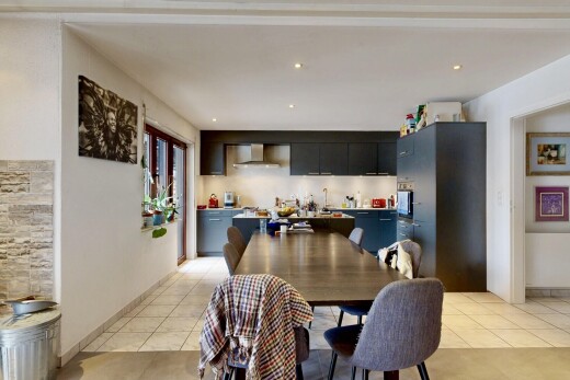 dining area with light tile patterned floors and recessed lighting