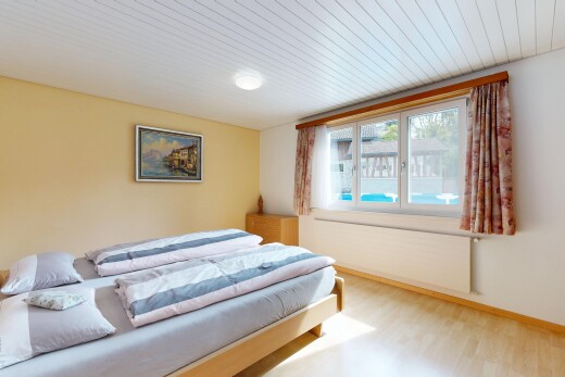 room featuring radiator and light wood finished floors