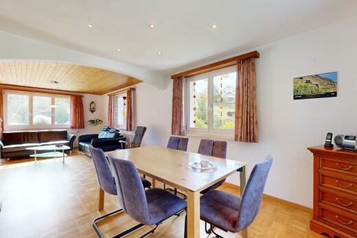 dining space featuring arched walkways, parquet flooring, and recessed lighting