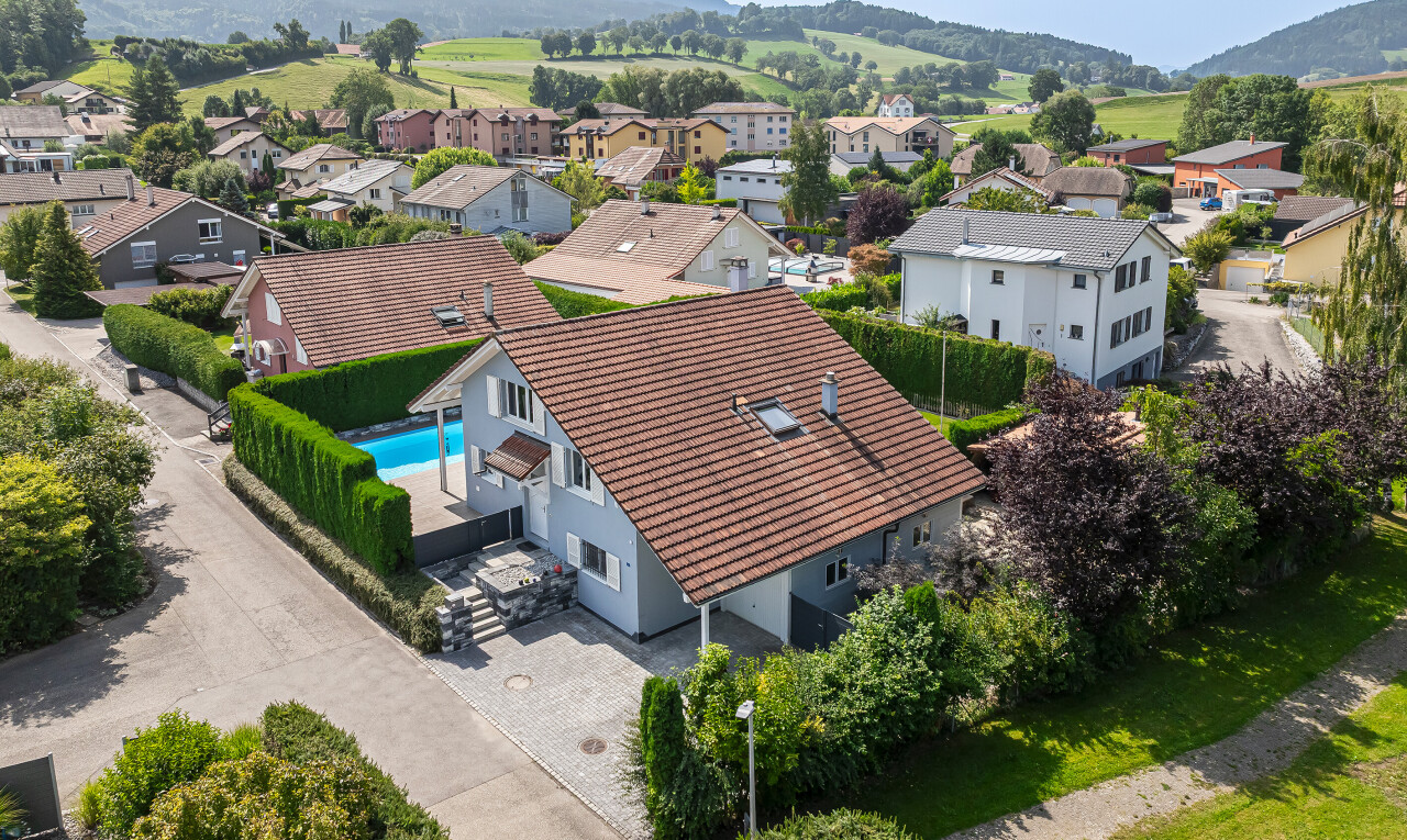 view of home featuring a residential view and a mountain view