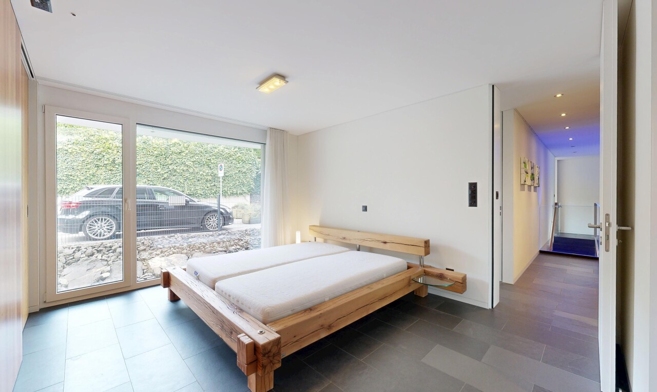 zimmer / schlafzimmer mit inside property, gipskartonwand, drywall, natürliches licht, und natural light