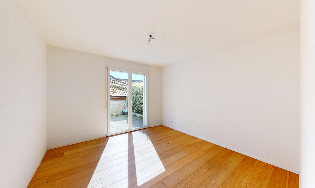 unfurnished room with light wood-type flooring