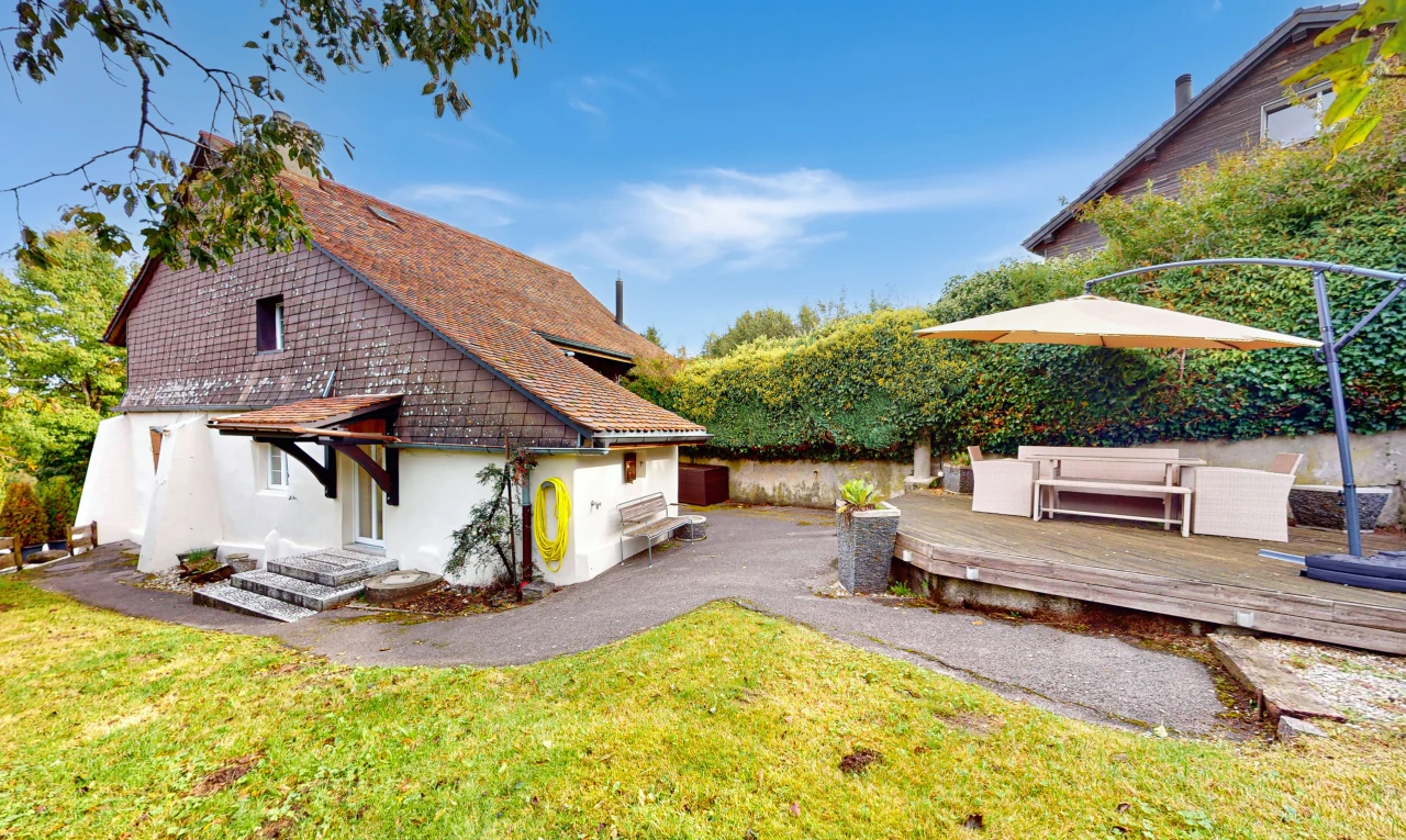 view of property with a patio area and a yard