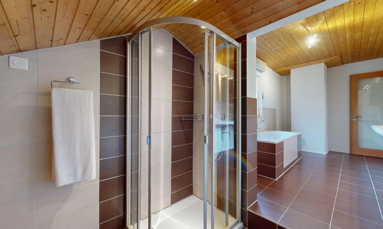 bathroom featuring shower with separate bathtub, lofted ceiling, and wood ceiling