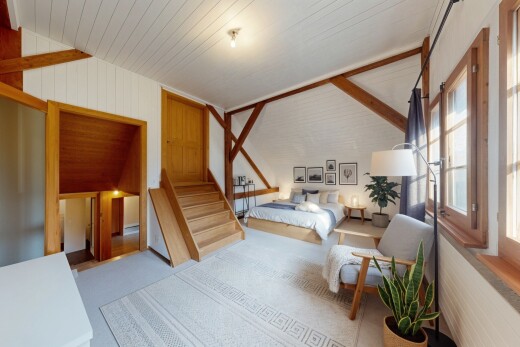 chambre avec virtually staged, vaulted ceiling, plafond voûté, inside property, et natural light