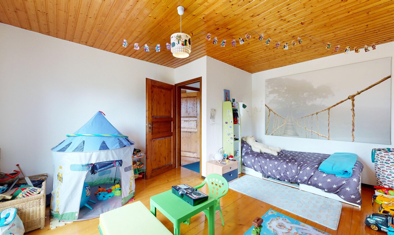 living room with wood finished floors and wood ceiling