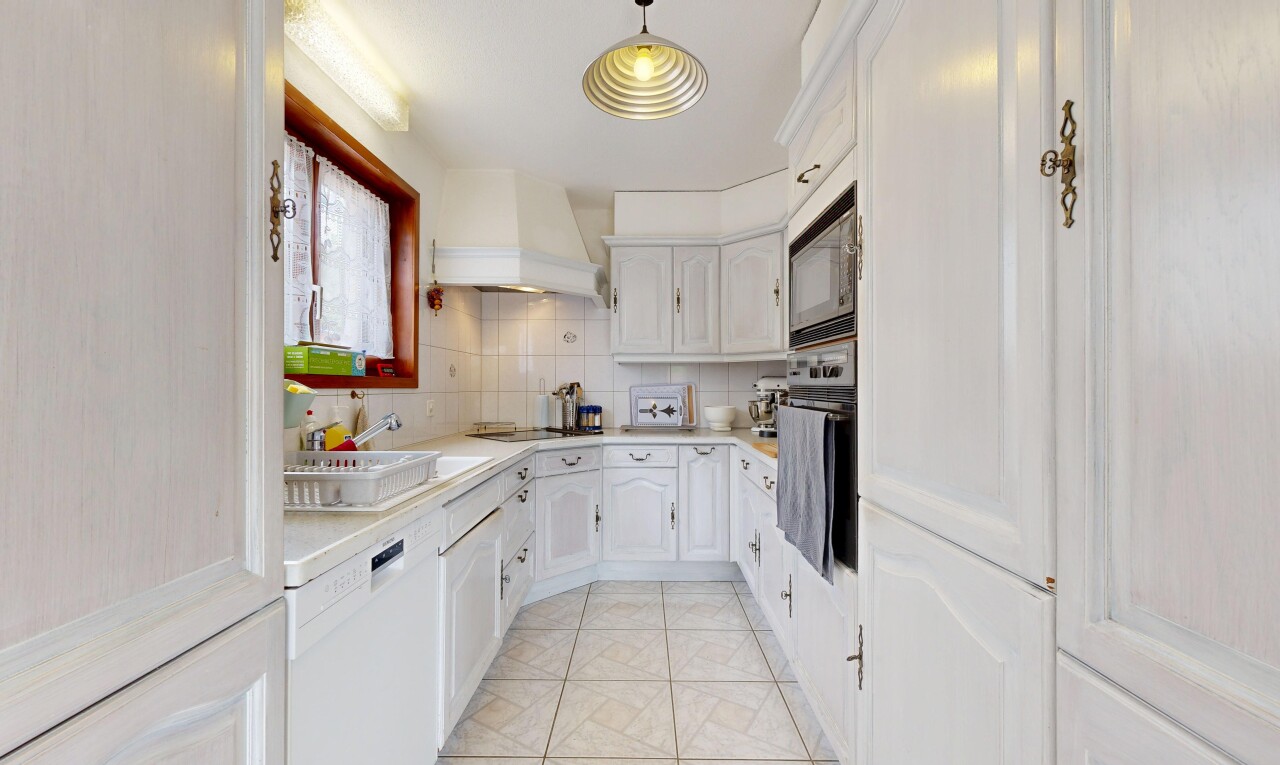 kitchen with white cabinetry, light countertops, tasteful backsplash, wall oven, and dishwasher