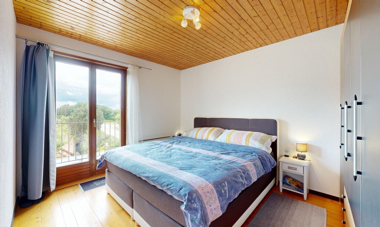 room / bedroom featuring access to outside, light wood-style flooring, and wooden ceiling