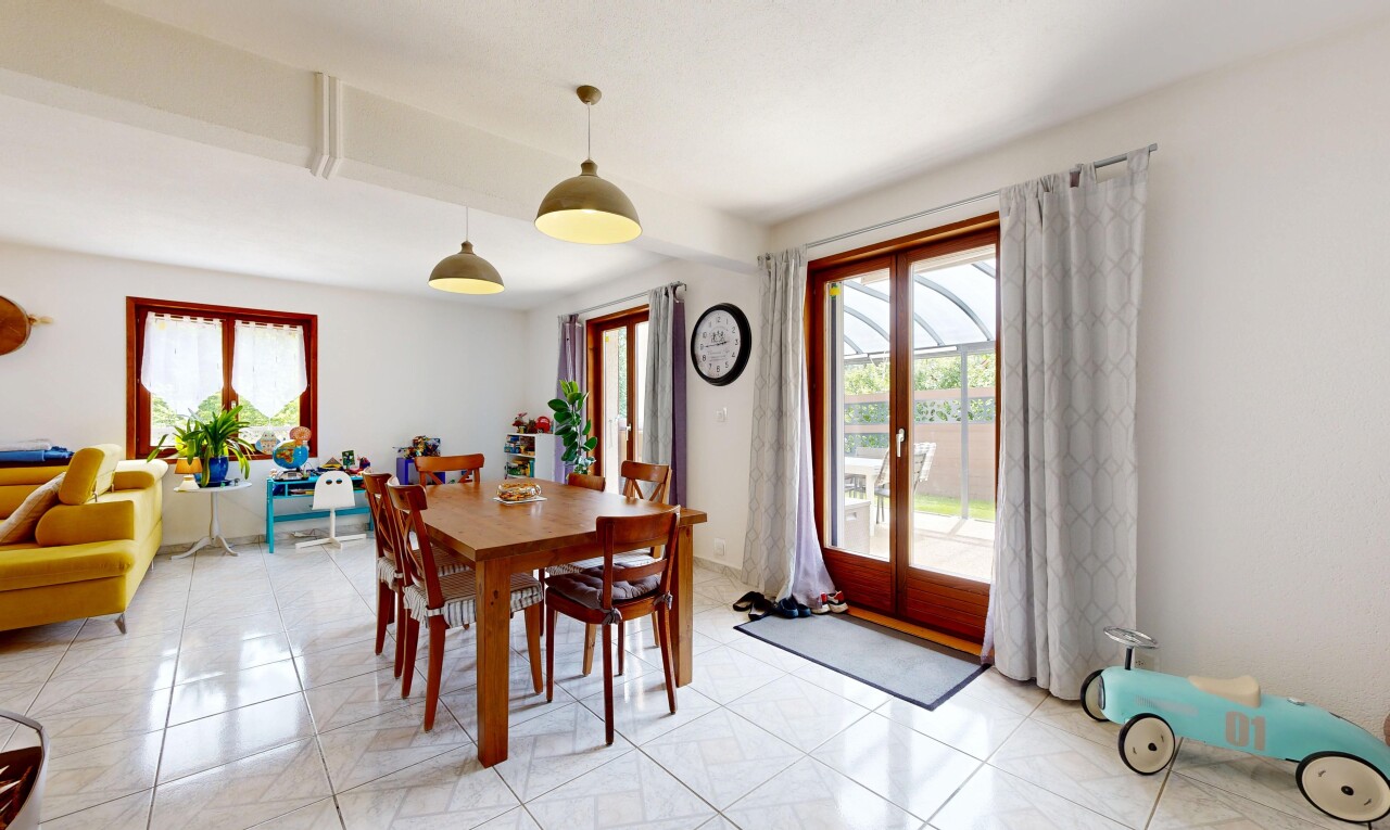 dining space featuring french doors and light tile patterned floors