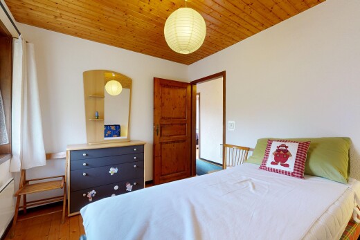 room featuring light wood-style floors and wood ceiling