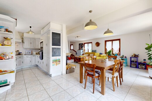 dining space featuring light tile patterned floors