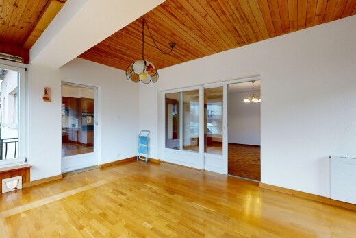 unfurnished room featuring hanging lights, wood ceiling, and wood finished floors