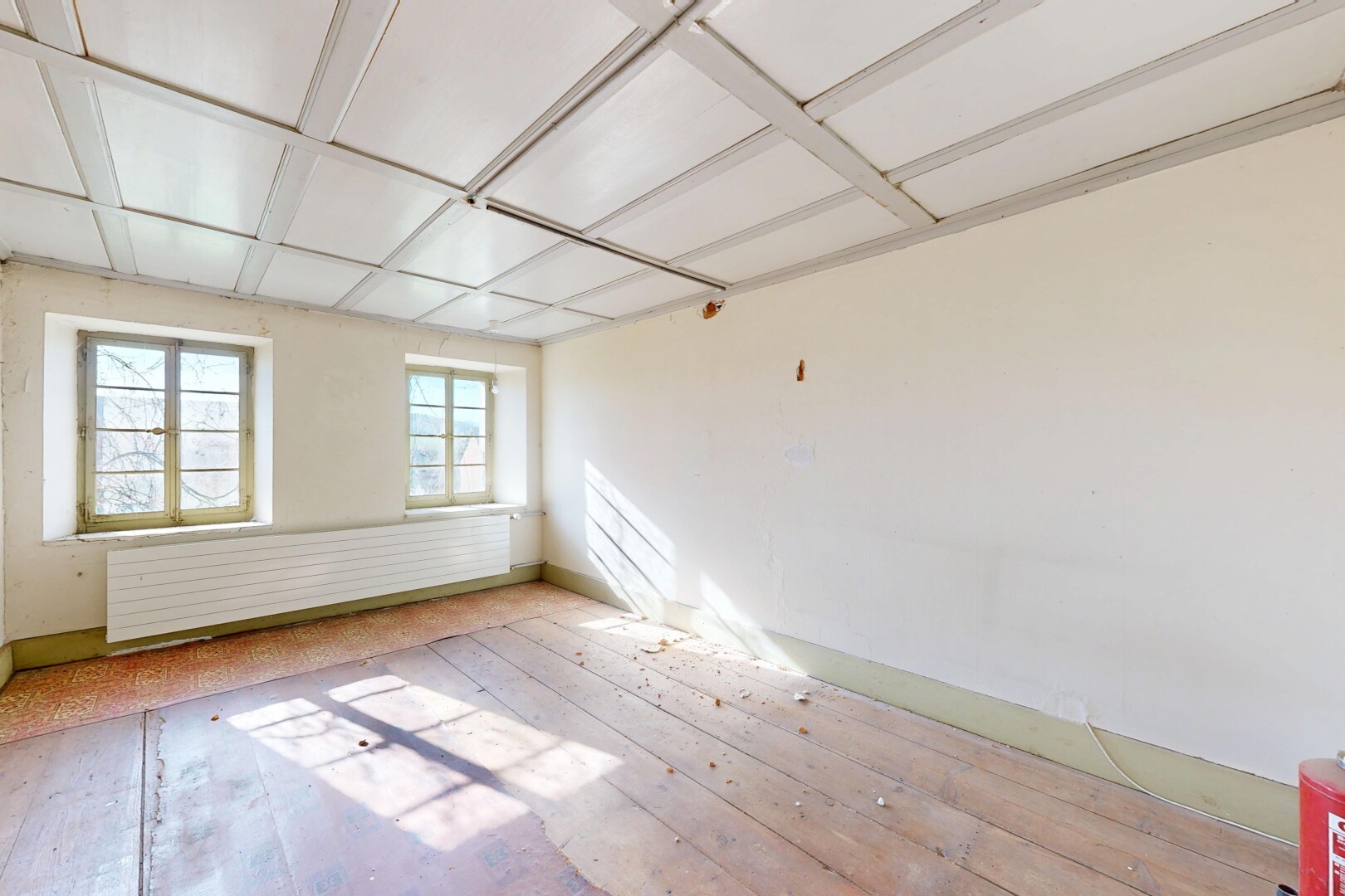 pièce vide avec cloison sèche, drywall, sol en finition bois, wood finish floor, et inside property