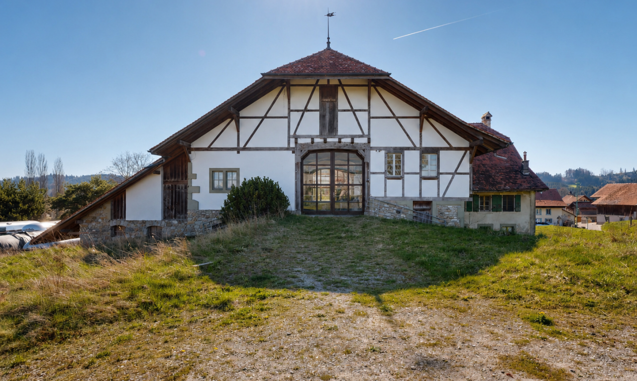 façade avec grange, day time, property visible, structure extérieure, et bardage en stuc