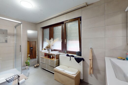 bathroom with vanity and separate shower and tub
