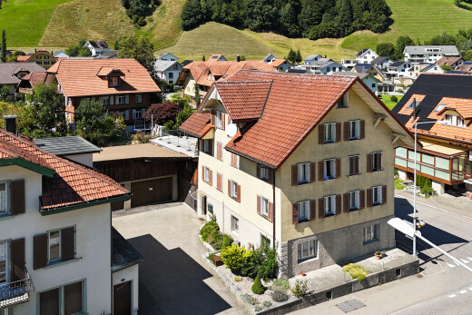 außenansicht mit wohngebietblick, residential view, stuckverkleidung, und drone view