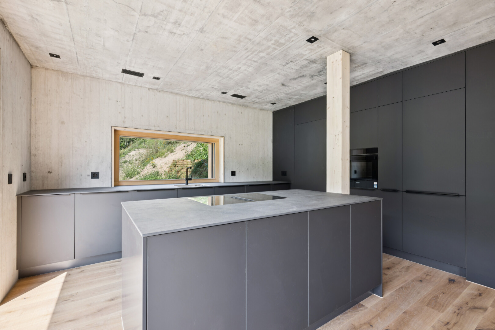 küche mit flat panel cabinets, schränke mit flachen paneelen, concrete ceiling, betondecke, und gray cabinets
