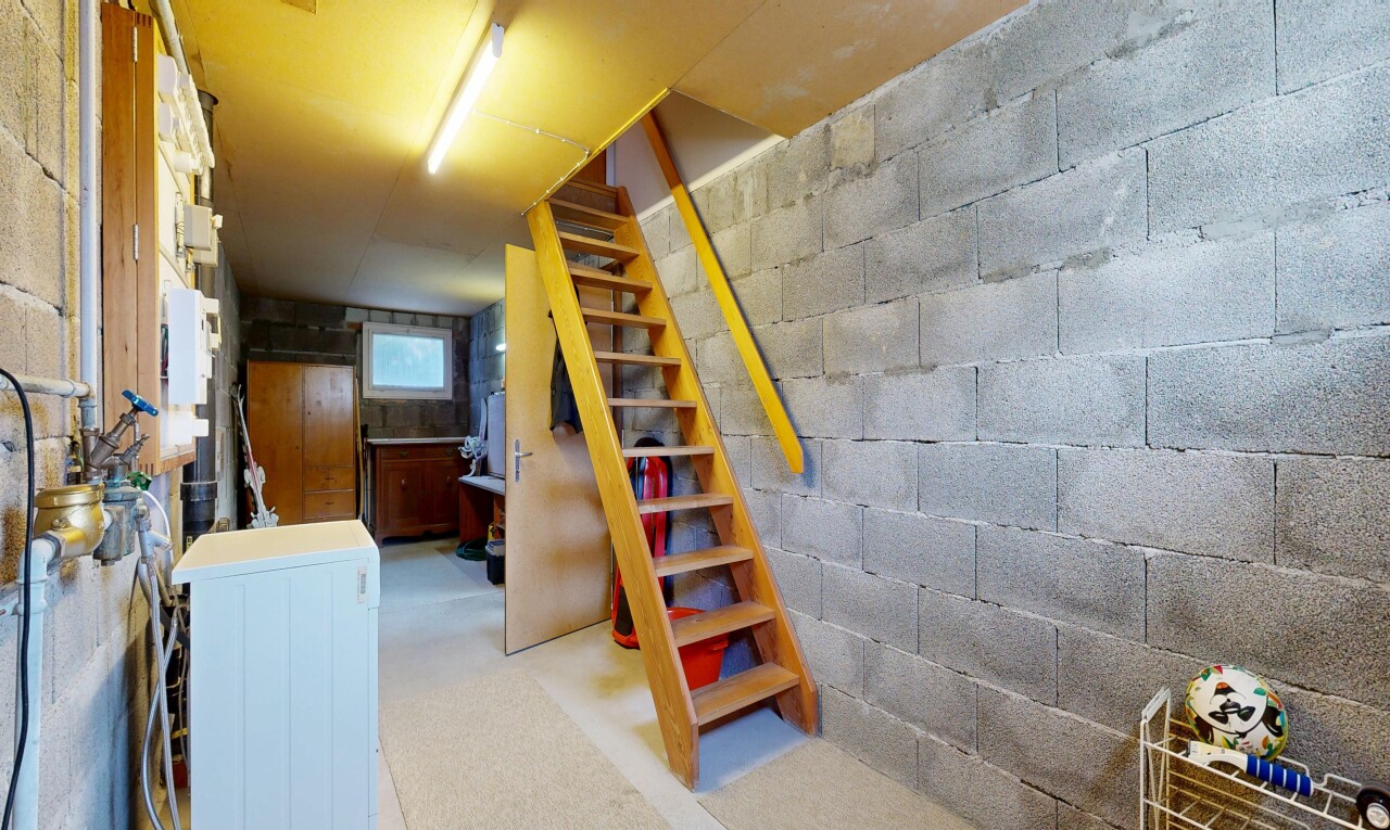 staircase with washer / dryer