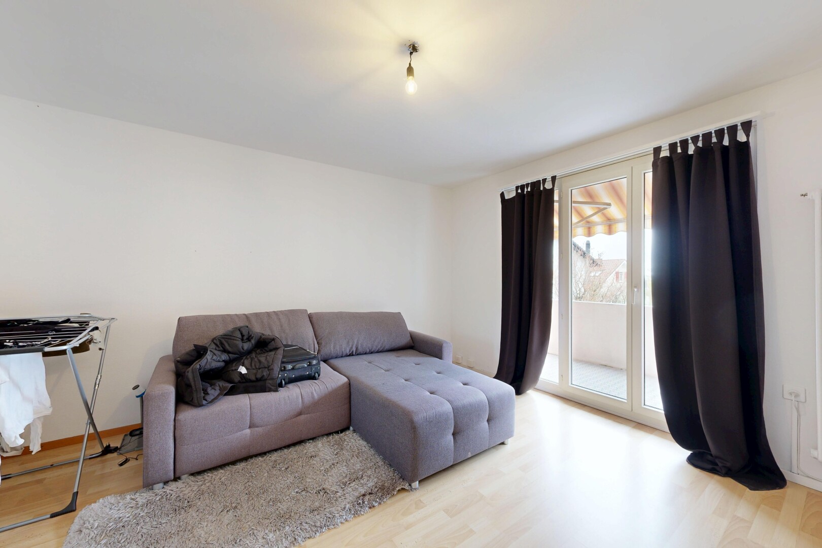 living area with light wood finished floors
