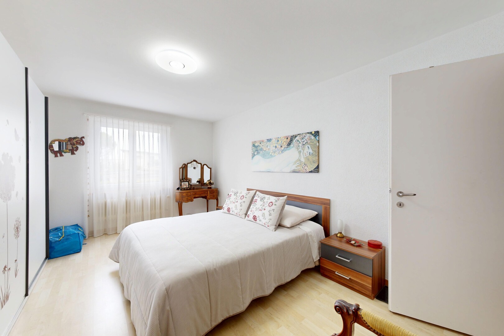 room / bedroom with light wood-type flooring