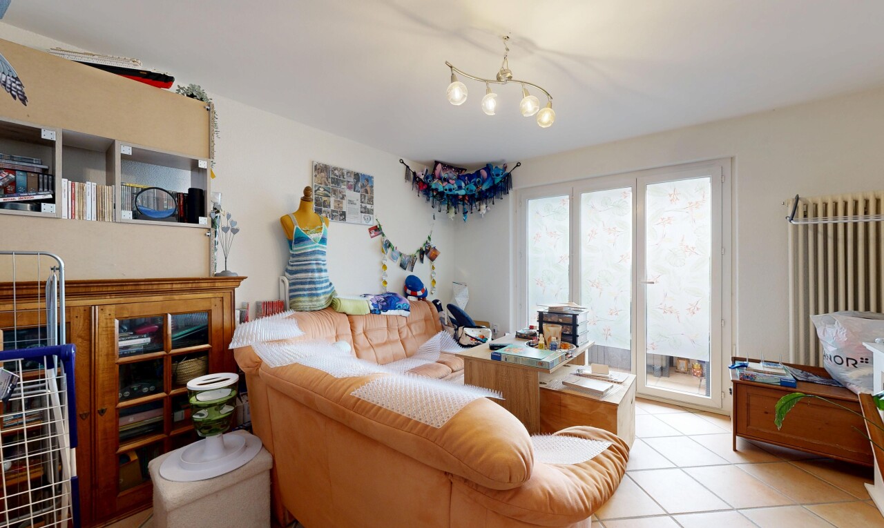 living room with light tile patterned floors