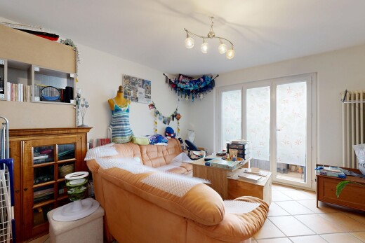 living room with light tile patterned floors