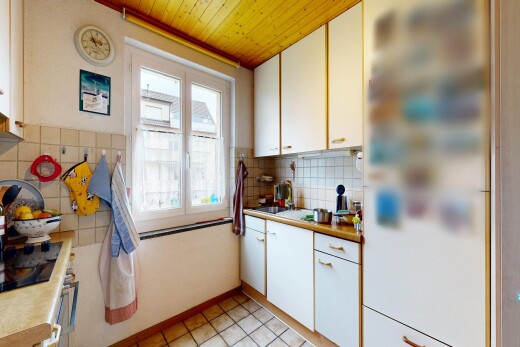 kitchen with white cabinets, light countertops, wooden ceiling, and light tile patterned floors