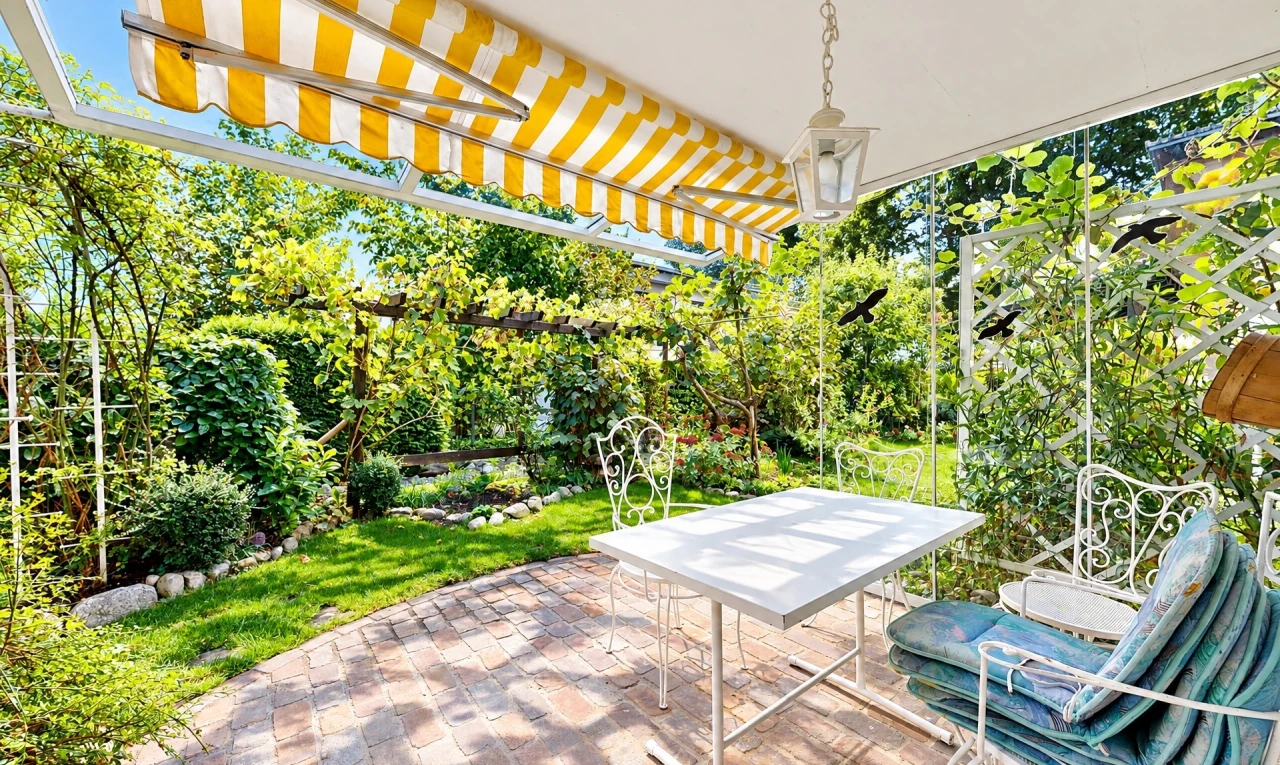 terrace featuring a patio area, outdoor dining area, and a pergola