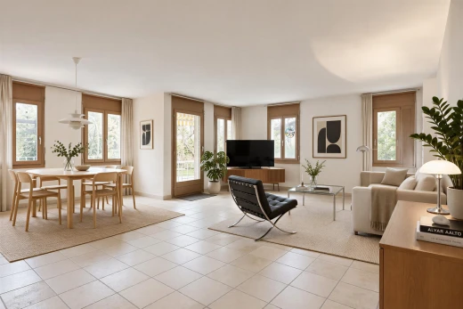 living area featuring pendant lighting, healthy amount of natural light, light tile patterned floors, and access to exterior