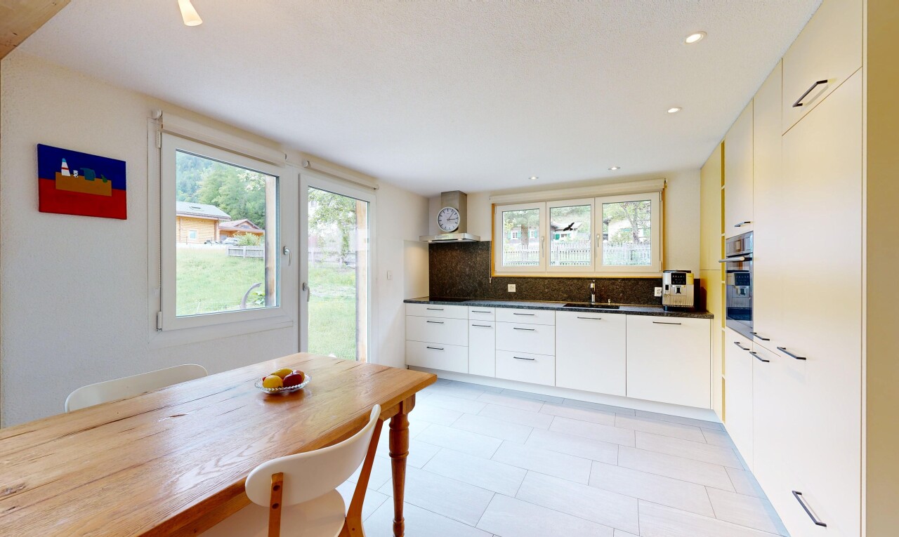 küche mit light floor, arbeitsplatten, dark countertops, gipskartonwand, und drywall