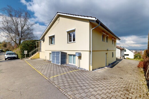 façade avec bardage en stuc et property visible