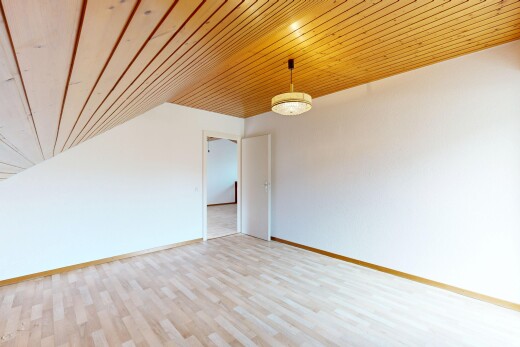 unfurnished room with wood ceiling, light wood finished floors, and hanging light fixtures