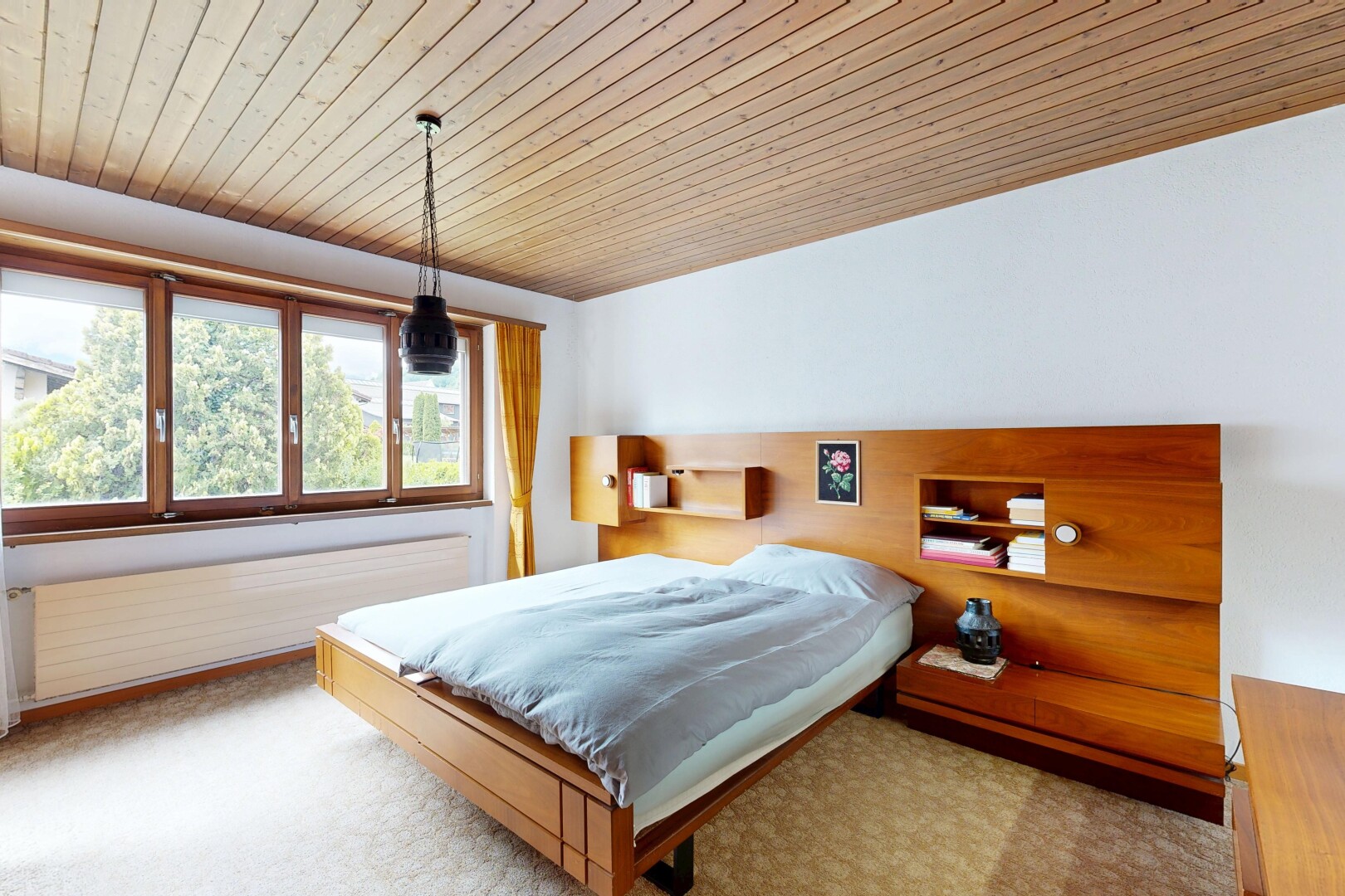 room / bedroom with wood ceiling and light colored carpet
