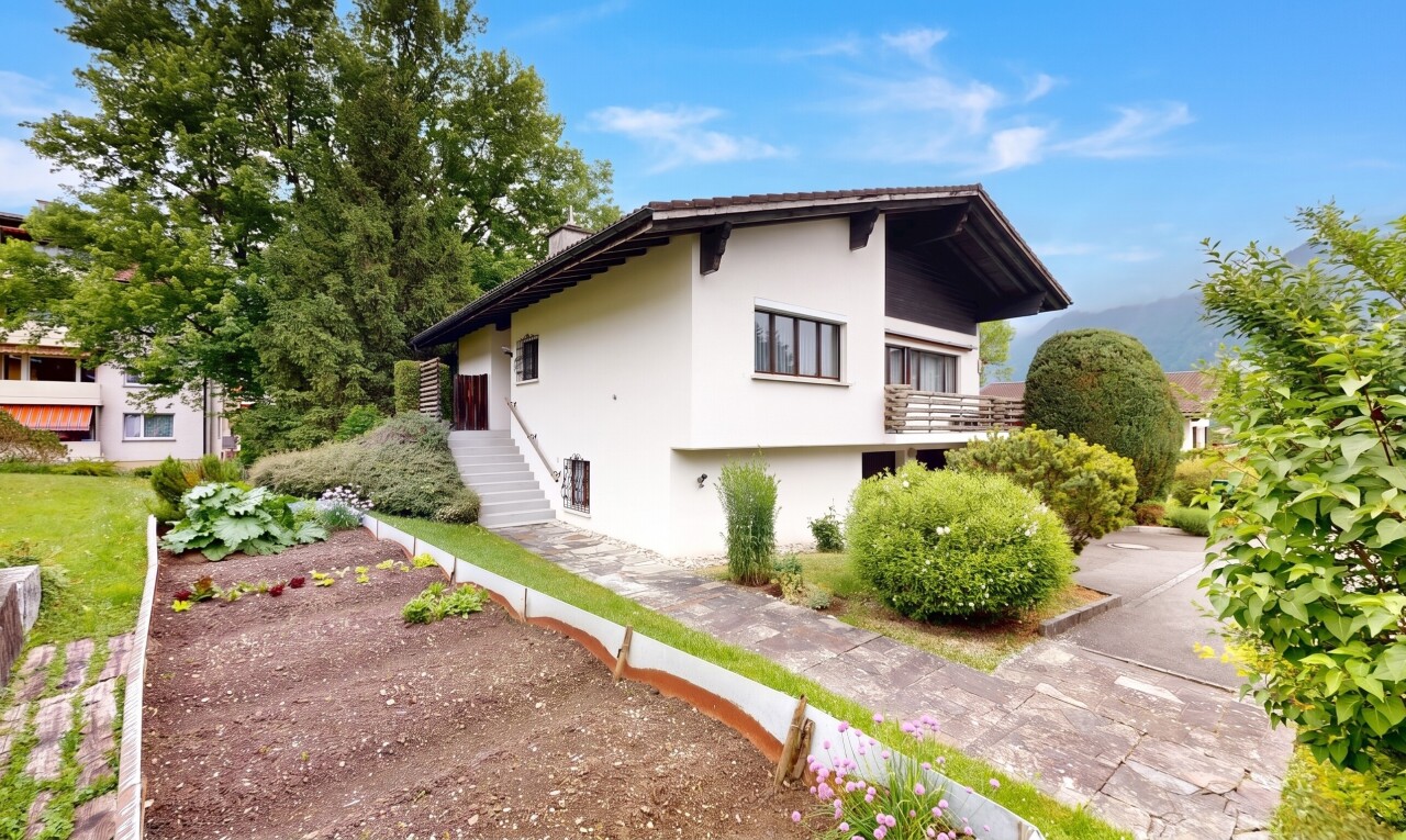 outdoor house with stucco siding