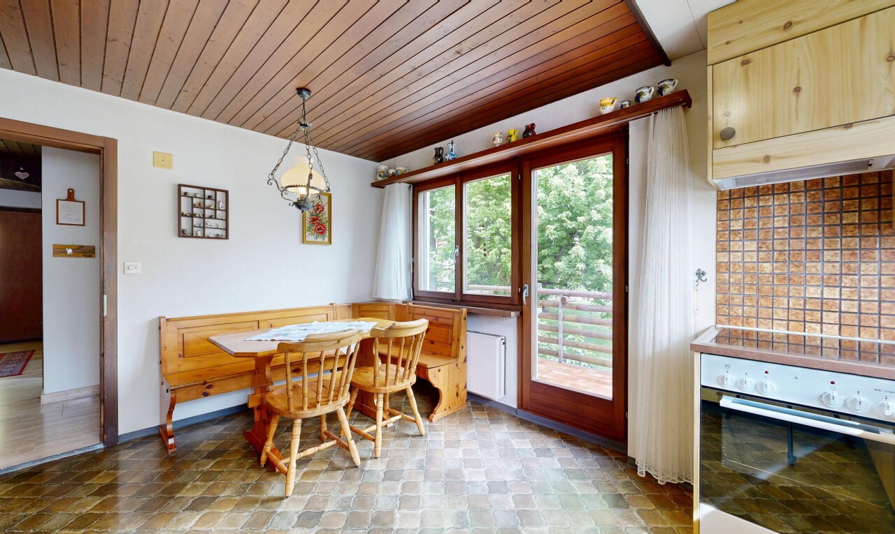 dining space with wooden ceiling and light floors