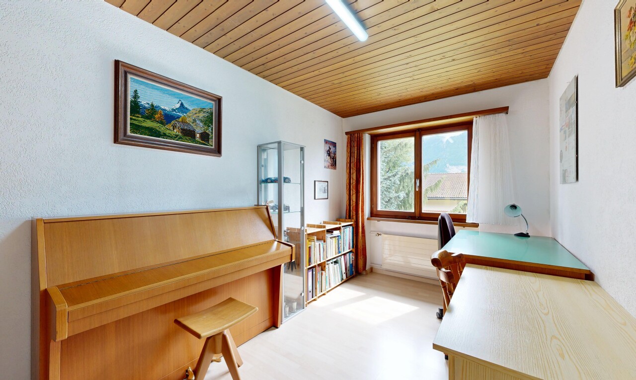 room / bedroom featuring an office area and wooden ceiling