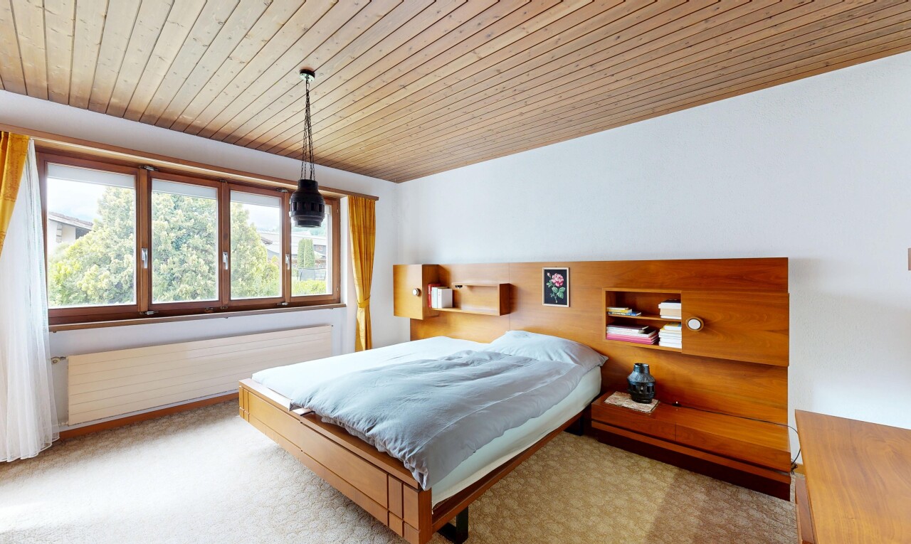 room / bedroom with wood ceiling and light colored carpet