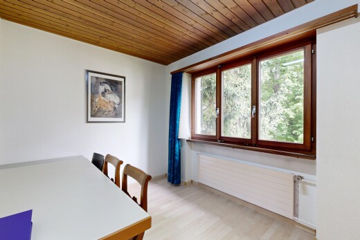 dining room featuring wooden ceiling, radiator heating unit, and light wood finished floors
