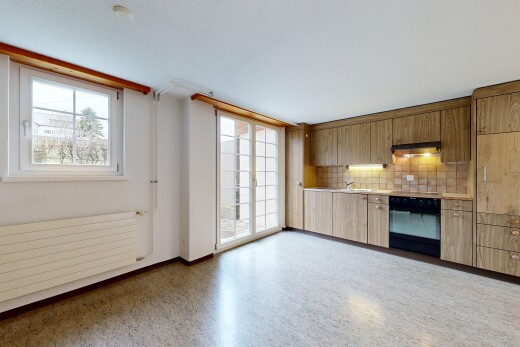 cuisine avec plans de travail, light countertops, four, drywall, et cloison sèche