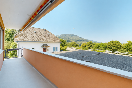 balcony featuring a mountain view