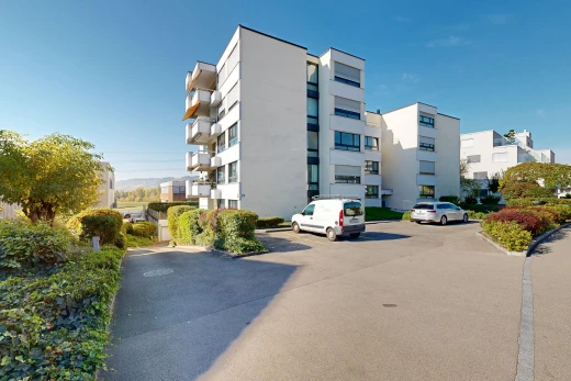 extérieur du bâtiment avec apartment complex view, vue sur le complexe d'appartements, parking, from community, et bordures