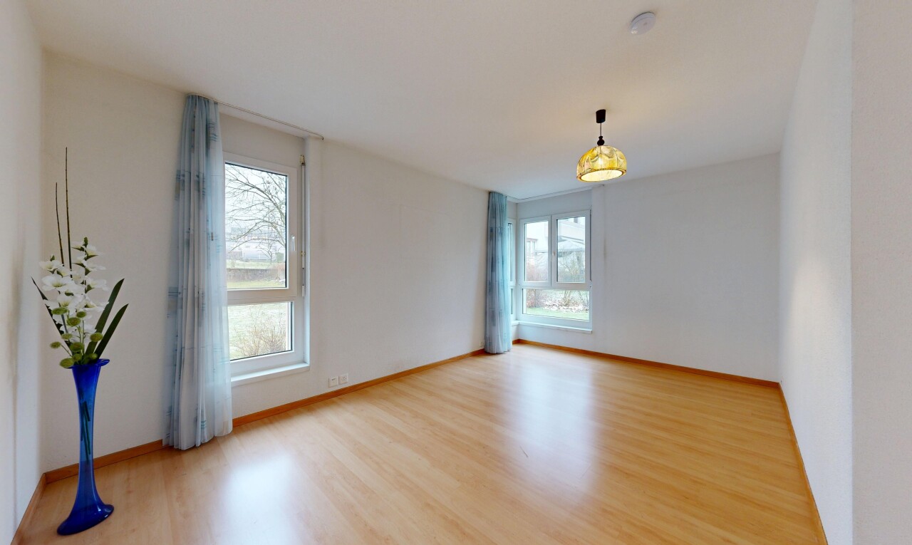 unfurnished room featuring light wood-style floors and baseboards