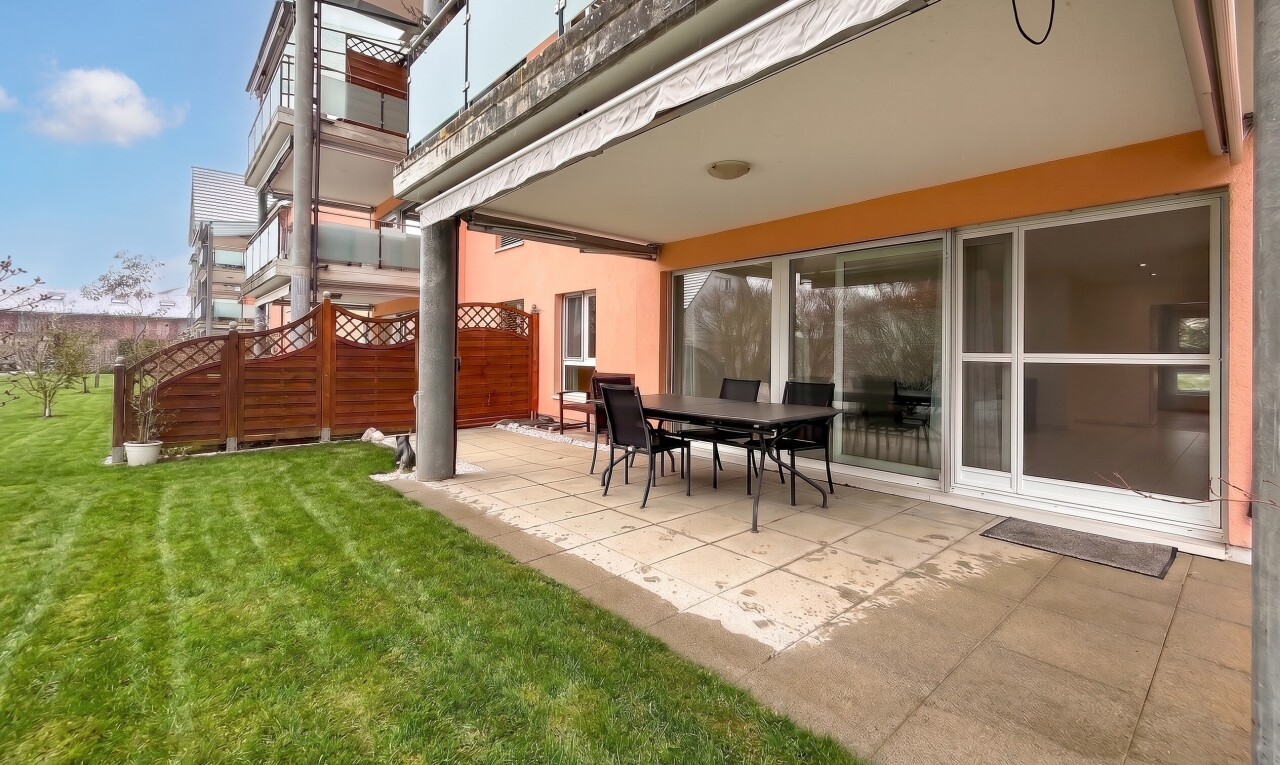 terrace featuring a patio area, outdoor dining area, and a balcony