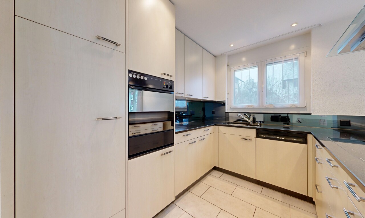 kitchen with black oven, dishwasher, recessed lighting, and light tile patterned flooring