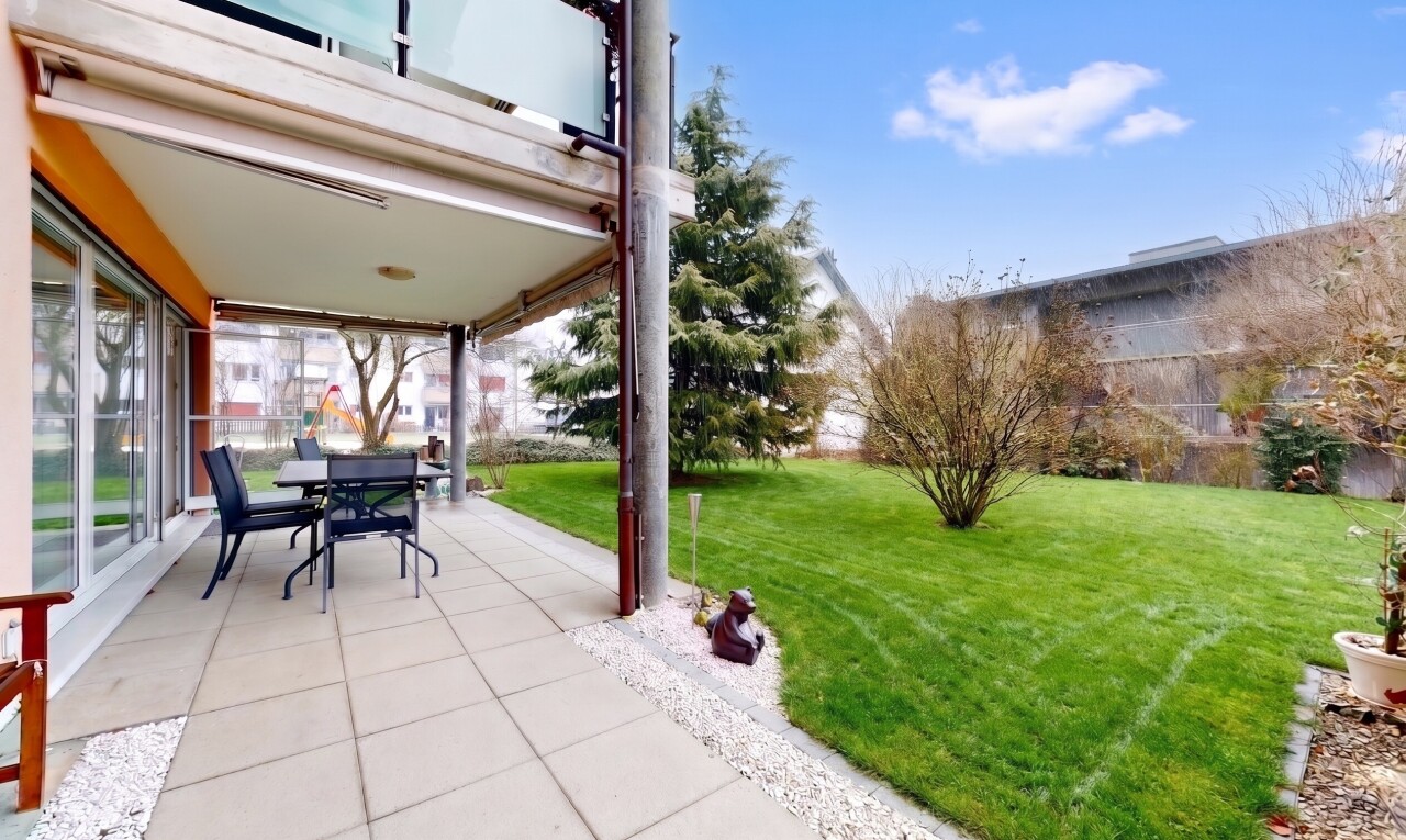 terrace with a patio and outdoor dining space
