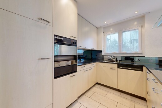 kitchen with black oven, dishwasher, recessed lighting, and light tile patterned flooring