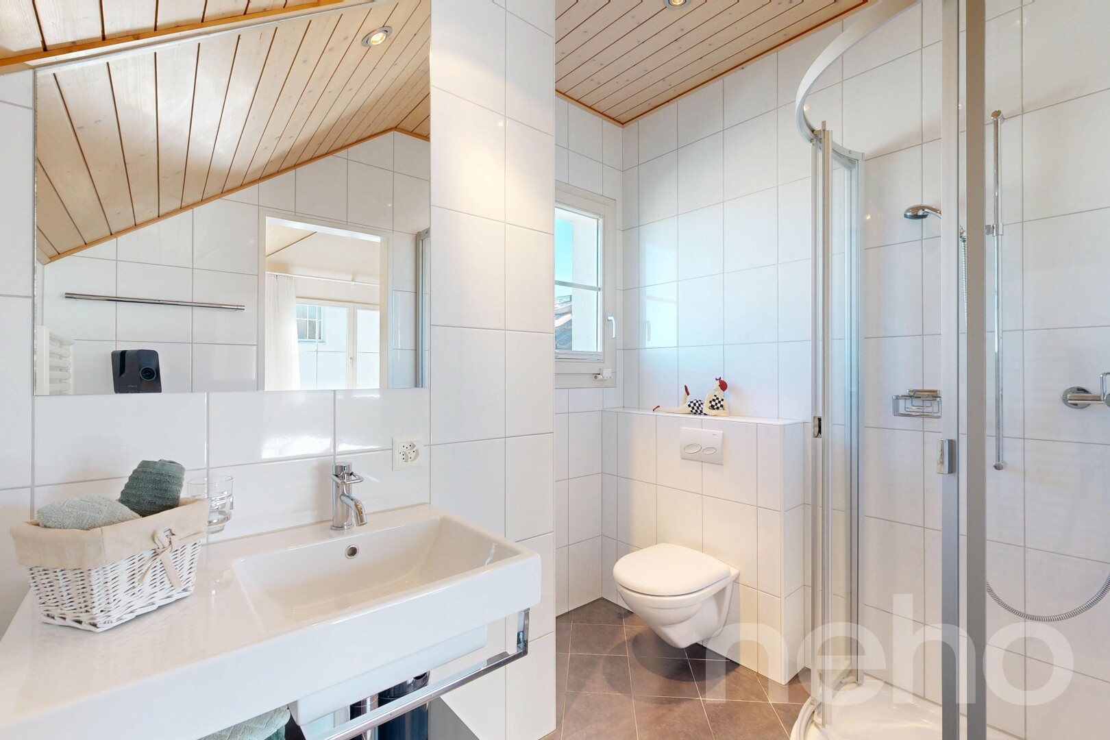 full bathroom featuring tile walls, a stall shower, and light tile patterned floors